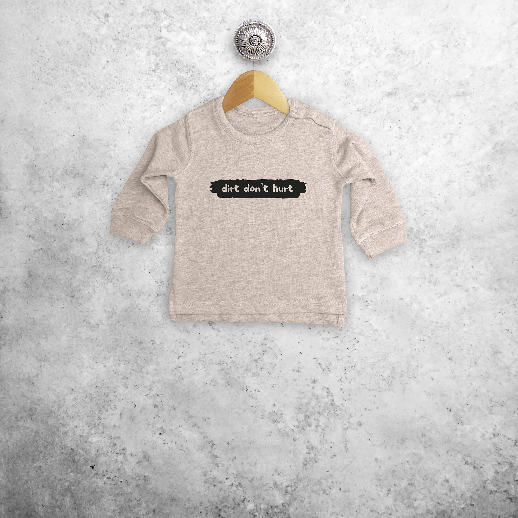 'Dirt don't hurt' baby sweater