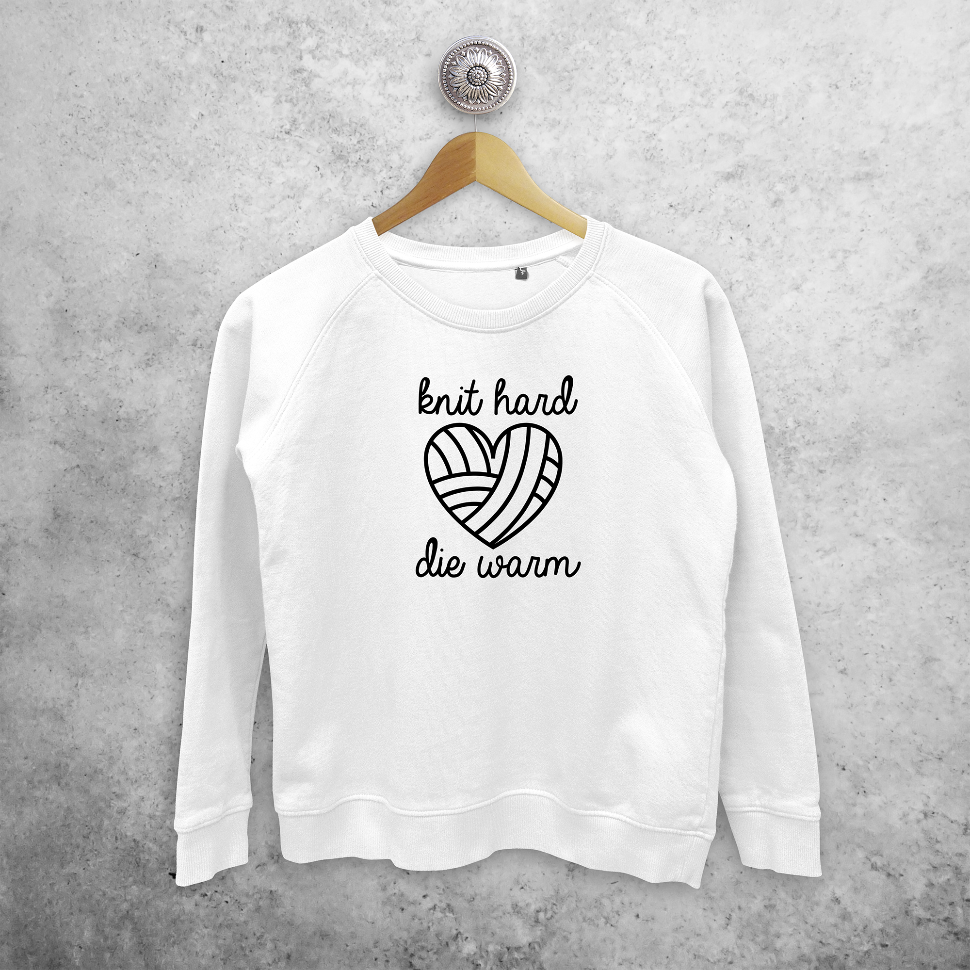 'Knit hard, die warm' sweater