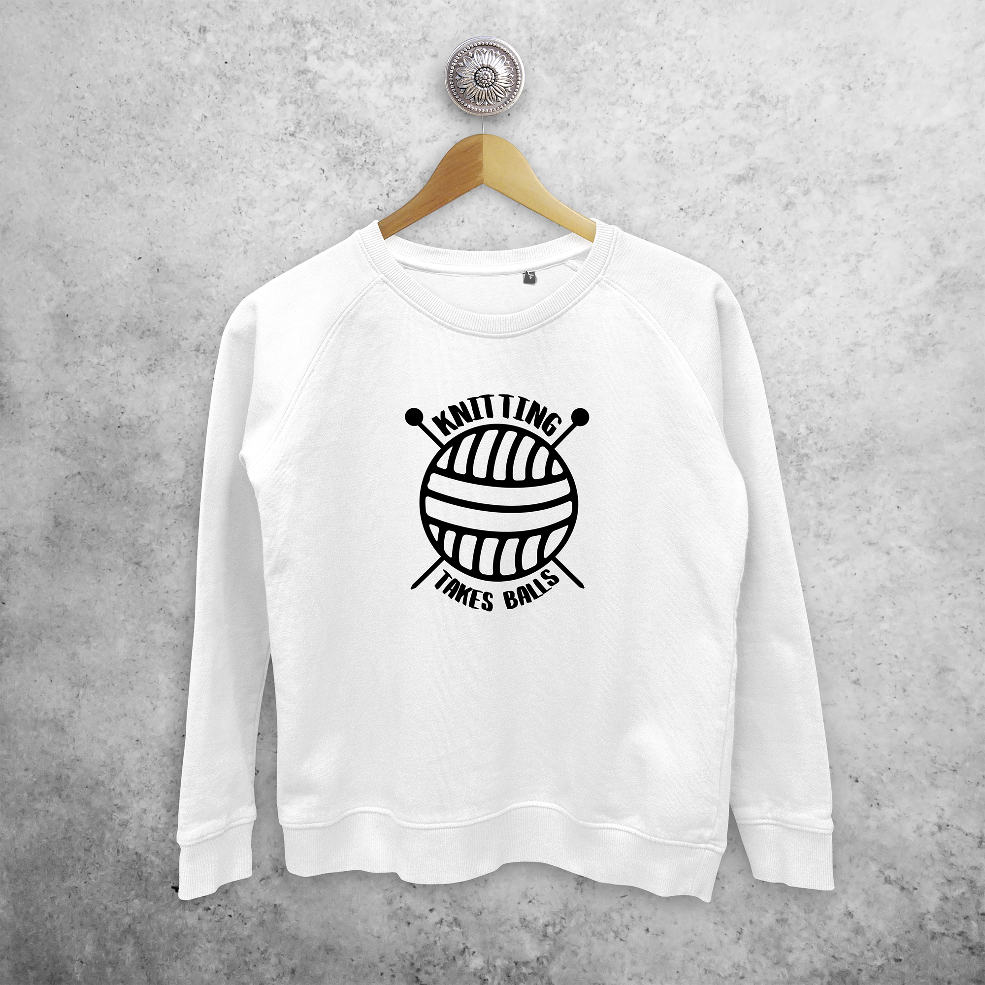'Knitting takes balls' sweater