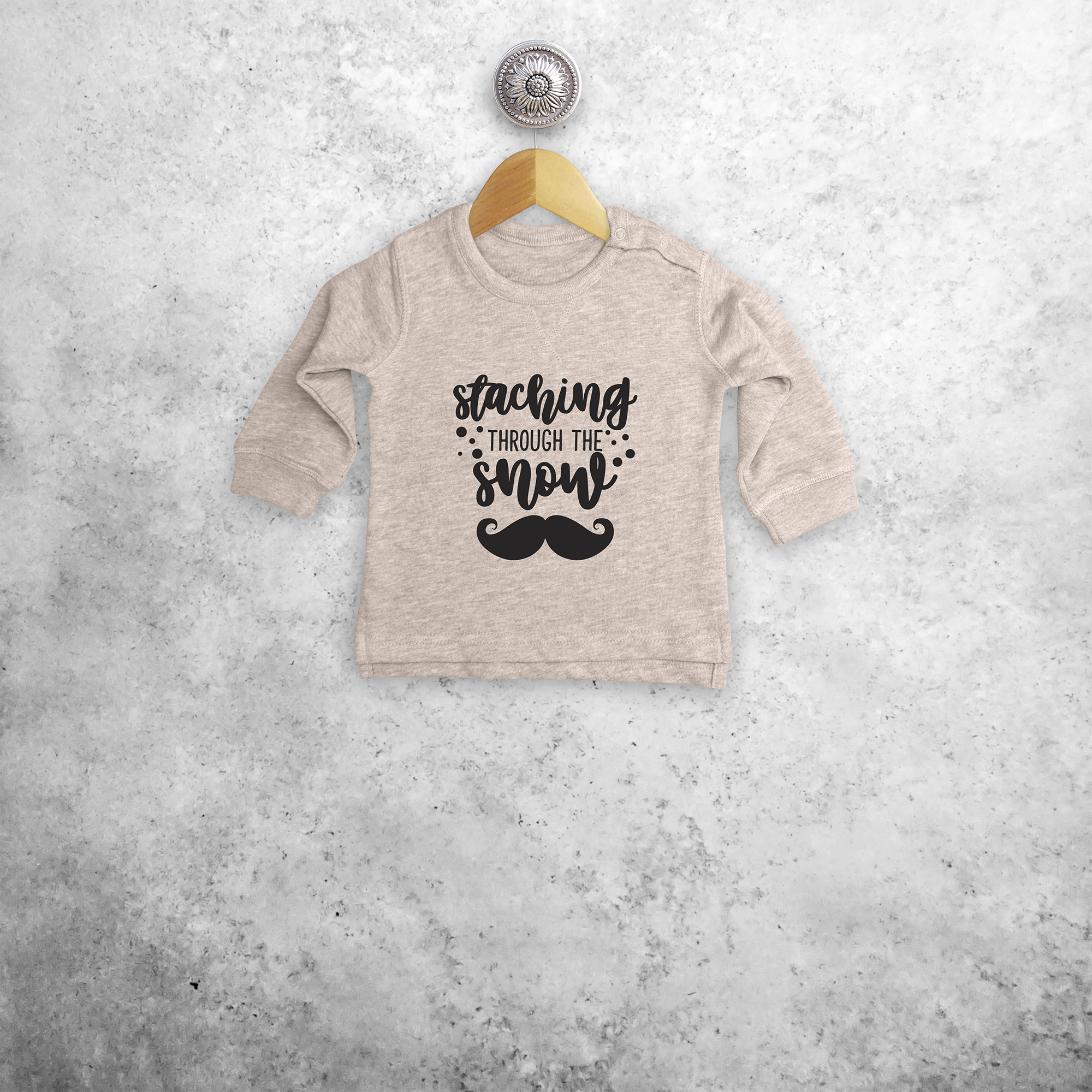 Baby or toddler sweater, with ‘Staching through the snow’ print by KMLeon.