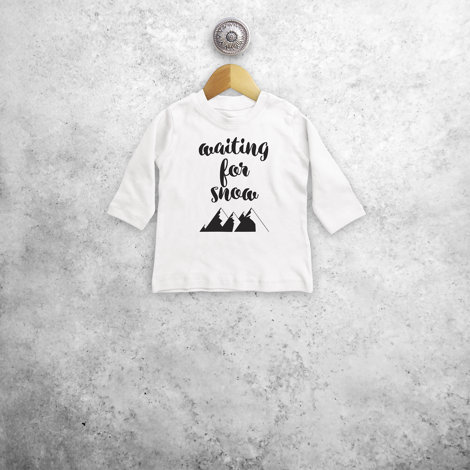 Baby or toddler shirt with long sleeves, with ‘Waiting for snow’ print by KMLeon.