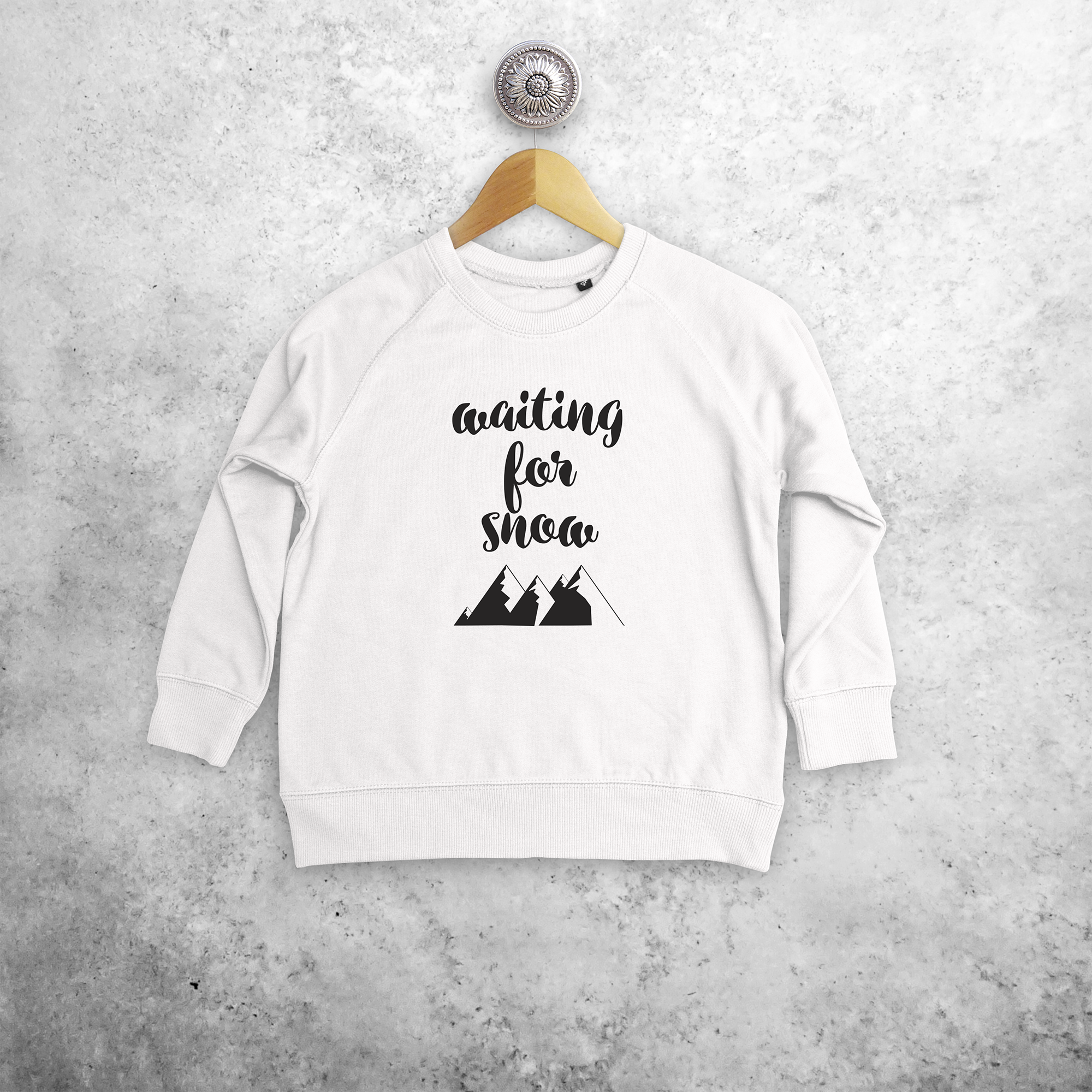 Kids sweater, with ‘Waiting for snow’ print by KMLeon.