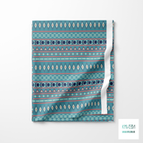 Geometric shapes in navy, mint green and pink fabric