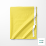 Solid corn yellow fabric