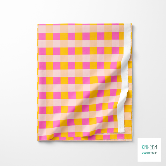 Pink and yellow gingham fabric