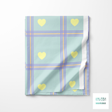 Orange and purple plaid with yellow hearts fabric