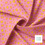 Pink and yellow leopard print fabric