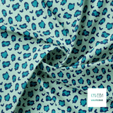 Teal and navy leopard print fabric