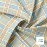 Orange, purple, blue and yellow tartan fabric