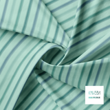 Soft horizontal stripes in green and blue fabric