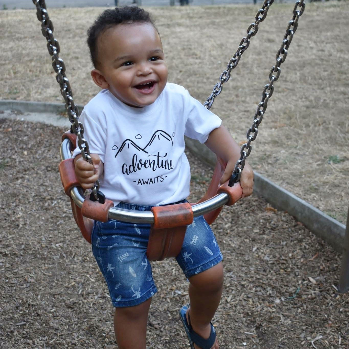 'Adventure awaits' baby shortsleeve shirt