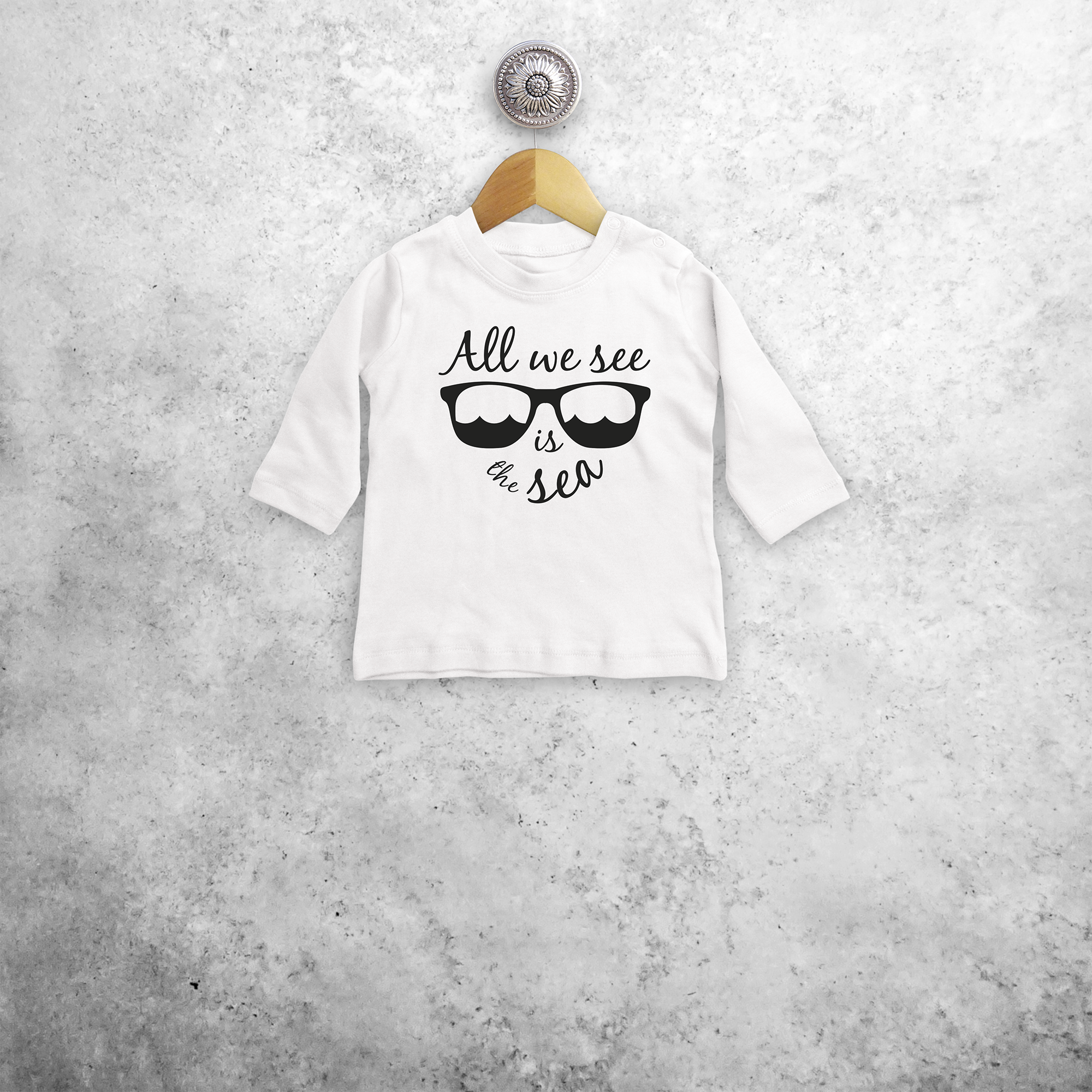 'All we see is the sea' baby longsleeve shirt