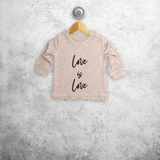 'Love is love' baby sweater