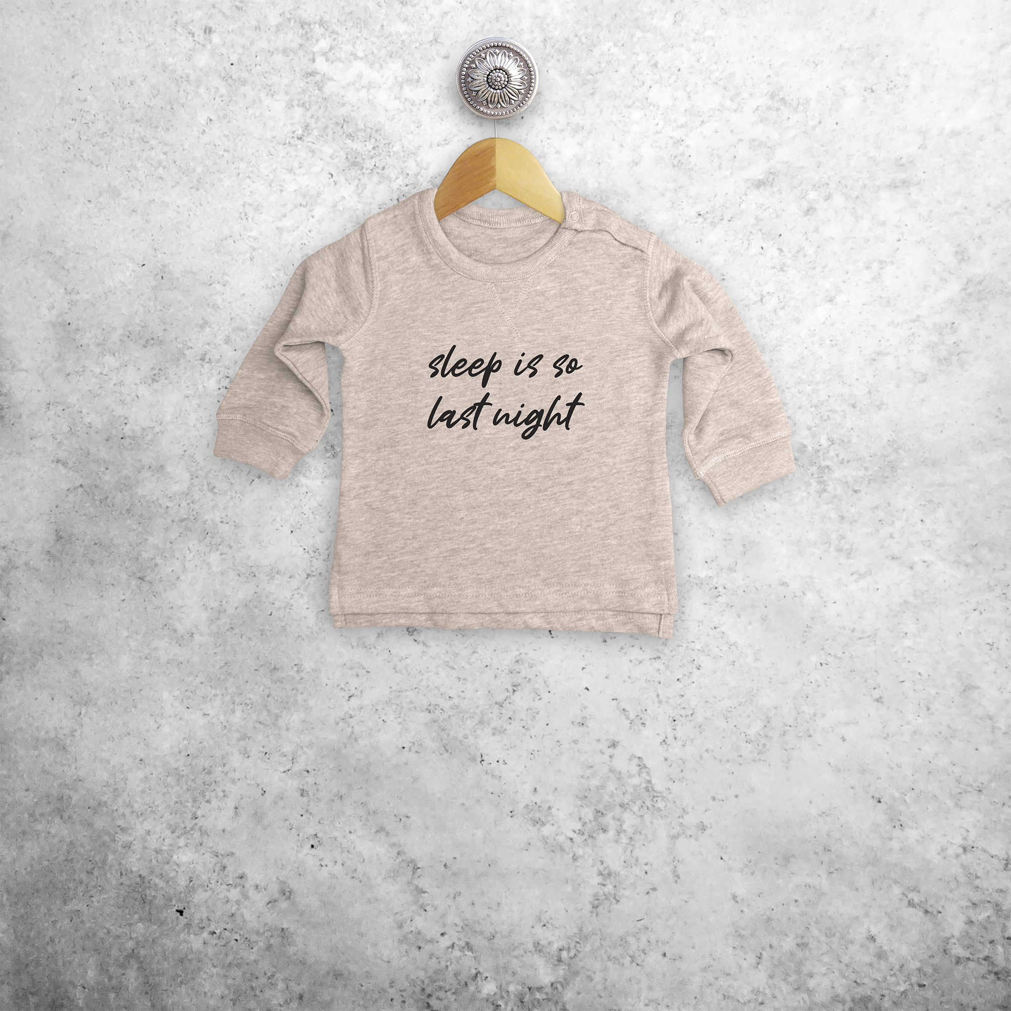 'Sleep is so last night' baby sweater