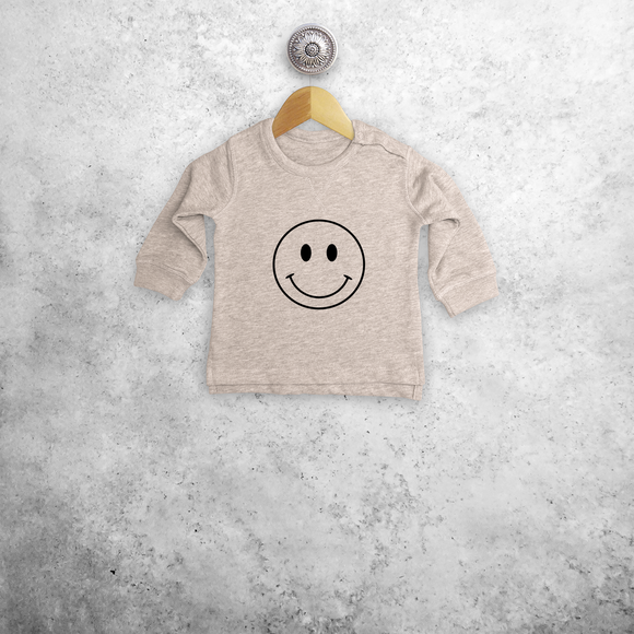 Smiley baby sweater