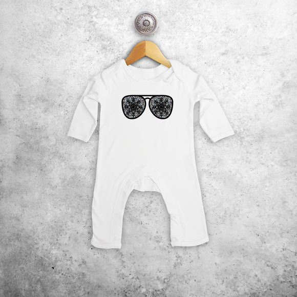 Baby or toddler romper with long sleeves, with glitter snow star glasses print by KMLeon.